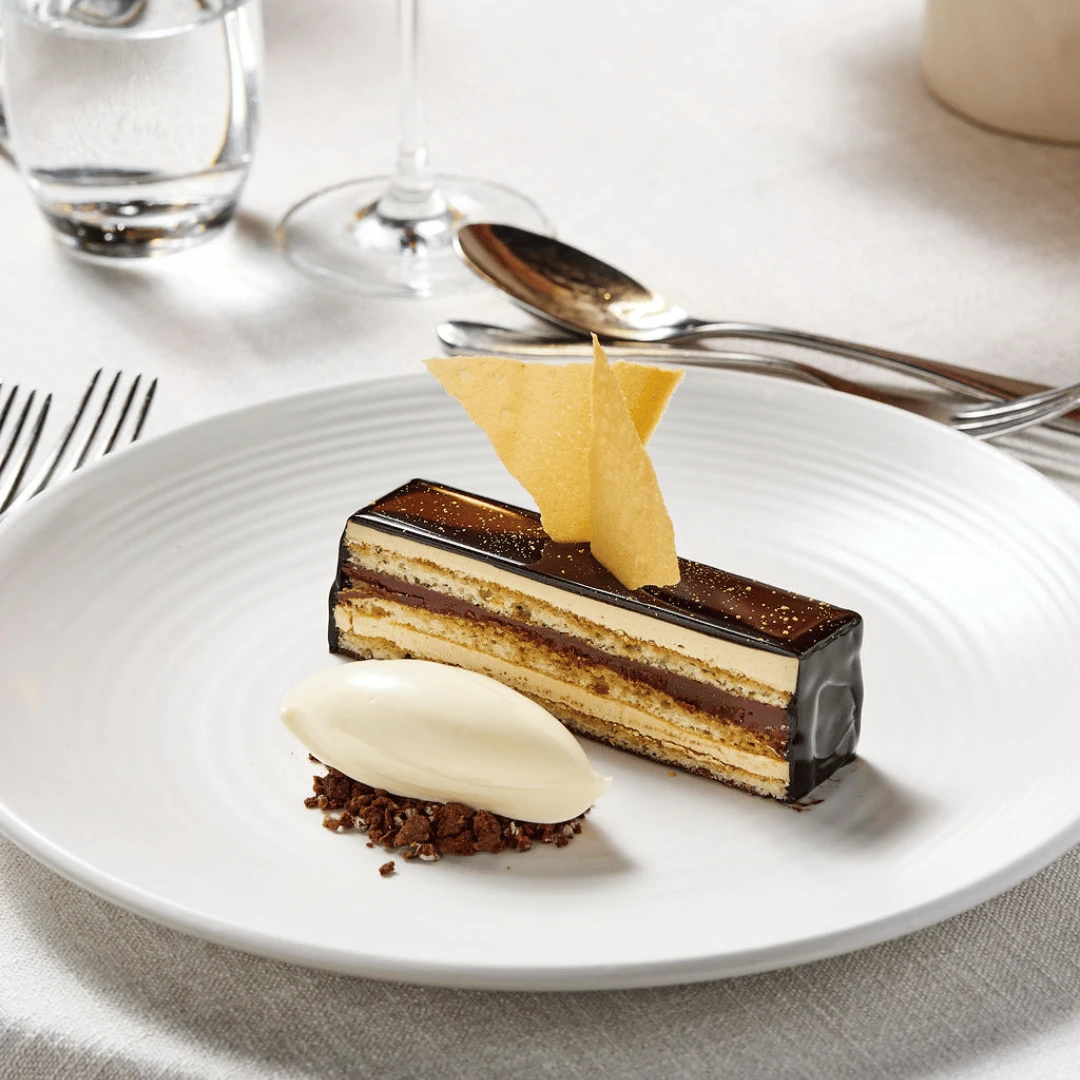 Vanilla sponge, coffee buttercream, dark chocolate, biscuit crumb, whipped ganache